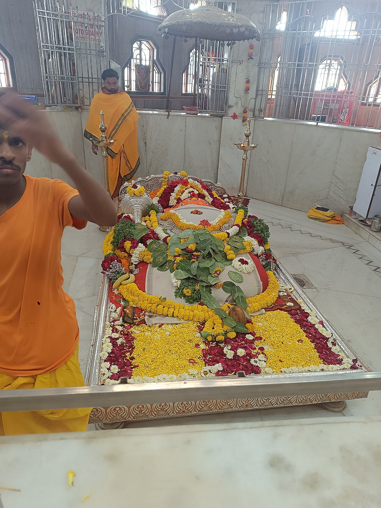 Reclining idol of Lord Hanuman in Bhava Samadhi at Bhadra Maruti Temple